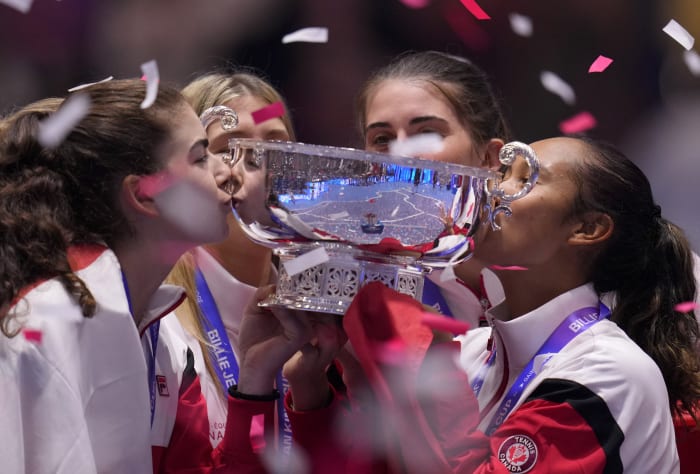 Former tennis player Billie Jean King (C) is joined by cast