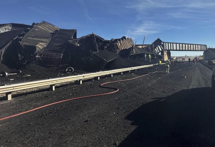 Semitruck driver killed when Colorado train derails spilling train cars and coal onto a highway Semitruck driver killed when Colorado train derails spilling train cars and coal onto a highway