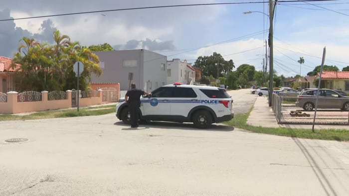 Police officers search for burglary suspect in Miami
