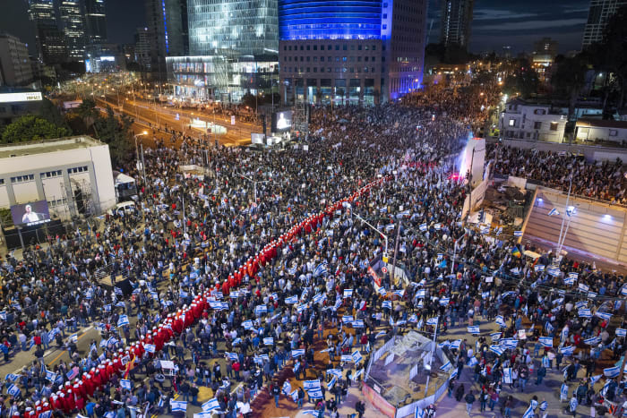Israeli defense minister calls for halt to judicial overhaul