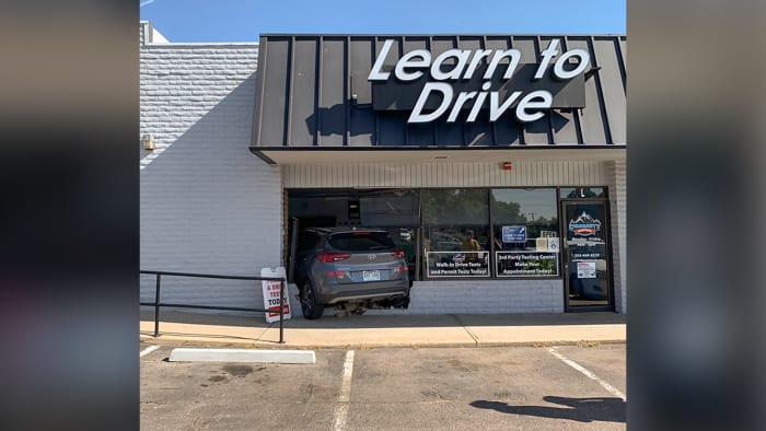 Instructor smashes vehicle through front of driving school, police say