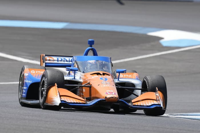 Dixon holds off hard-charging Rahal to win Indianapolis GP on record-breaking day