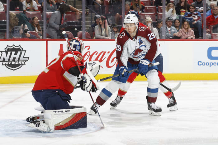 Nathan MacKinnon hat trick clinches division title for Avalanche