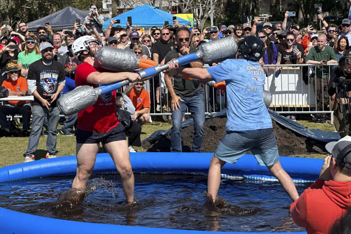 At the Florida Man Games, big crowds cheer competitors evading police, wrestling over beer
