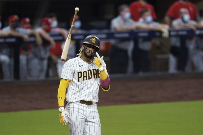 San Diego Padres' Matt Carpenter scores during the second inning