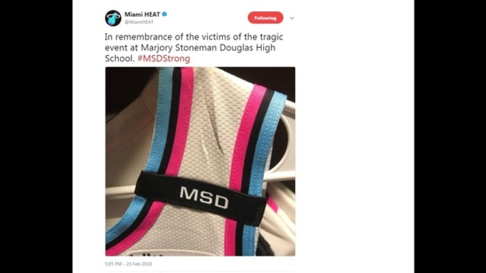 MLB teams wearing Marjory Stoneman Douglas High School caps at