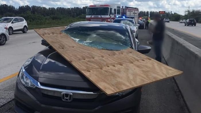 Florida driver lucky to be alive after plywood impales windshield