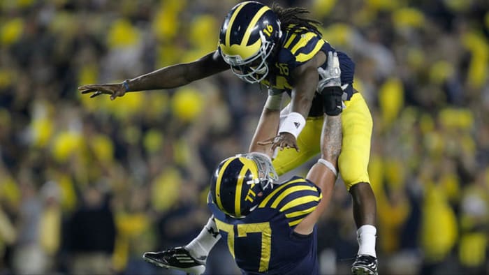 Watch Tom Brady & Jim Harbaugh play catch at Michigan Stadium - Big Ten  Network