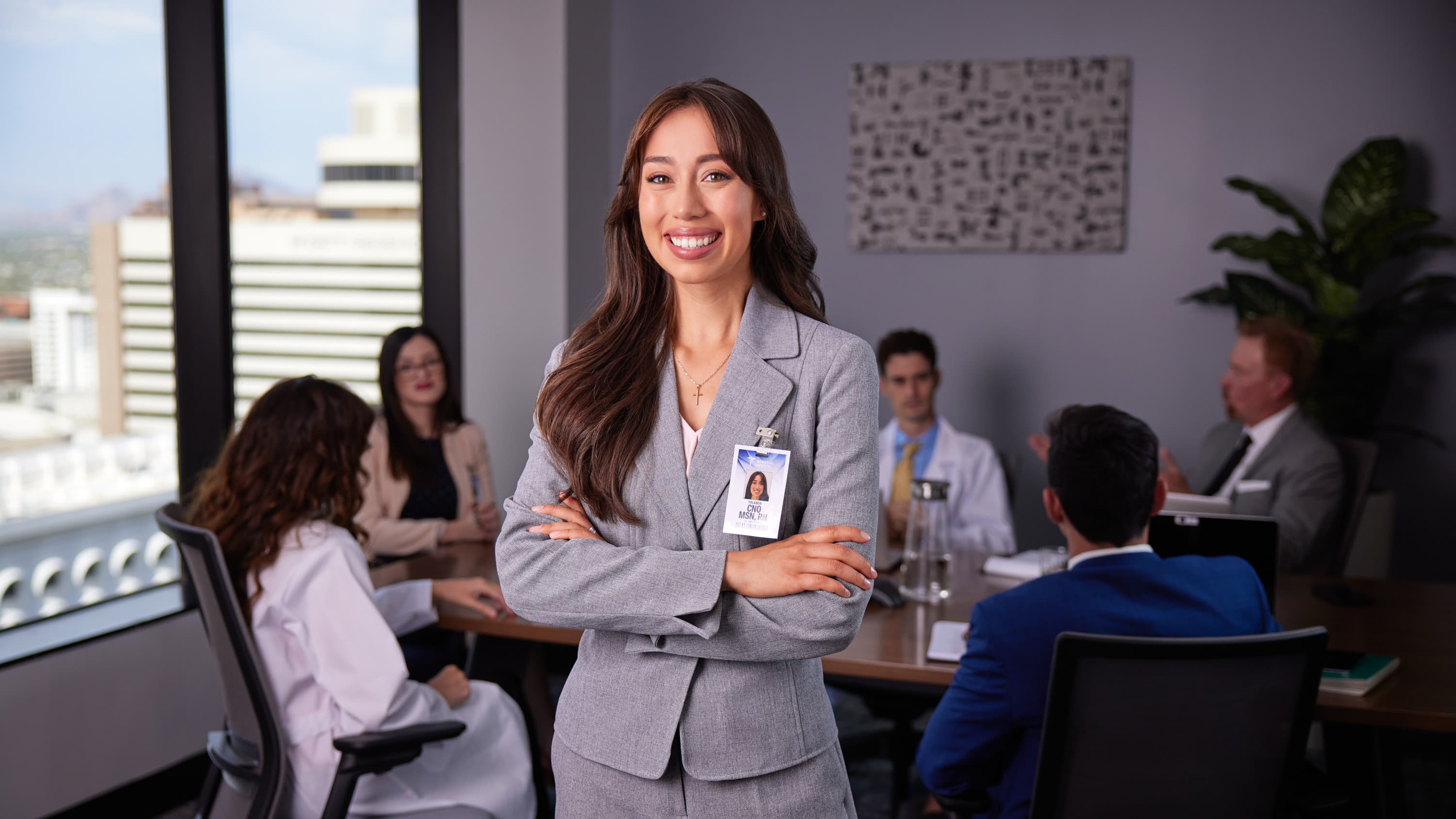 Portrait of GCU enrollment counselor meeting with doctors and accrediting bodies