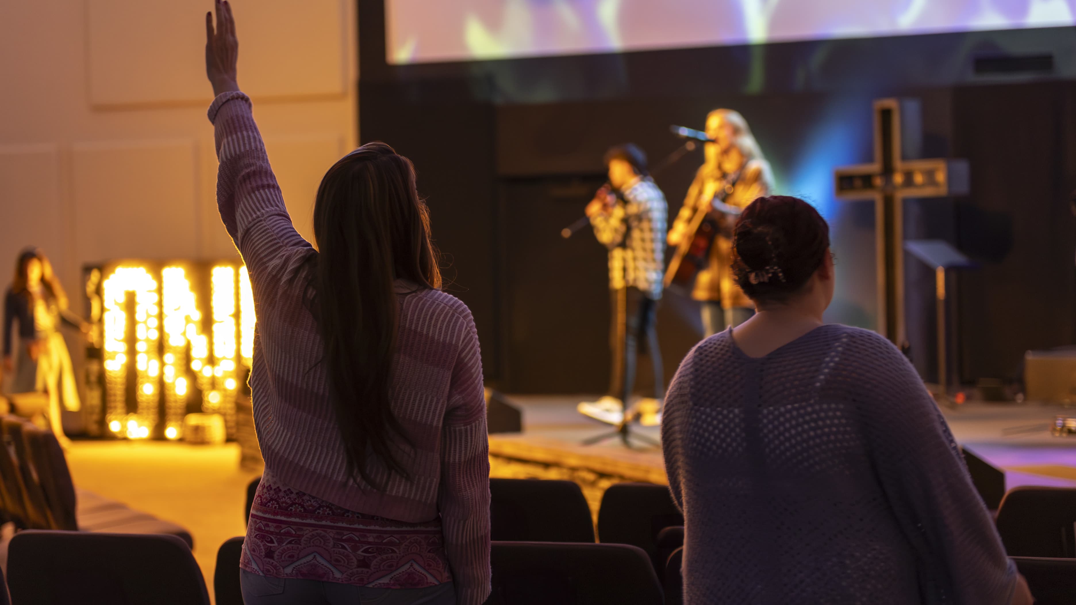 Female ministry degree students worshipping