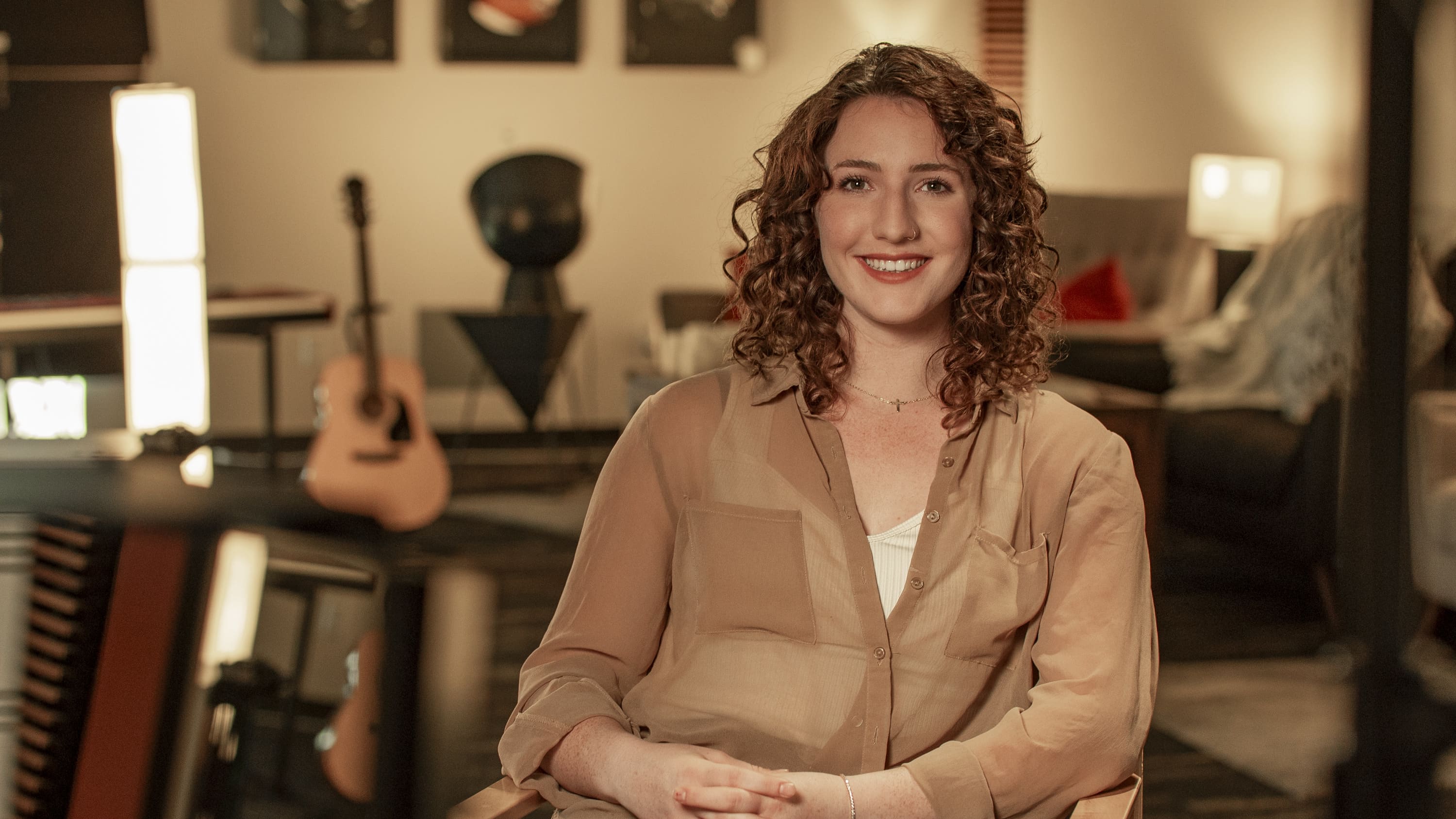Bachelor's ministry degree student smiling in worship arts studio