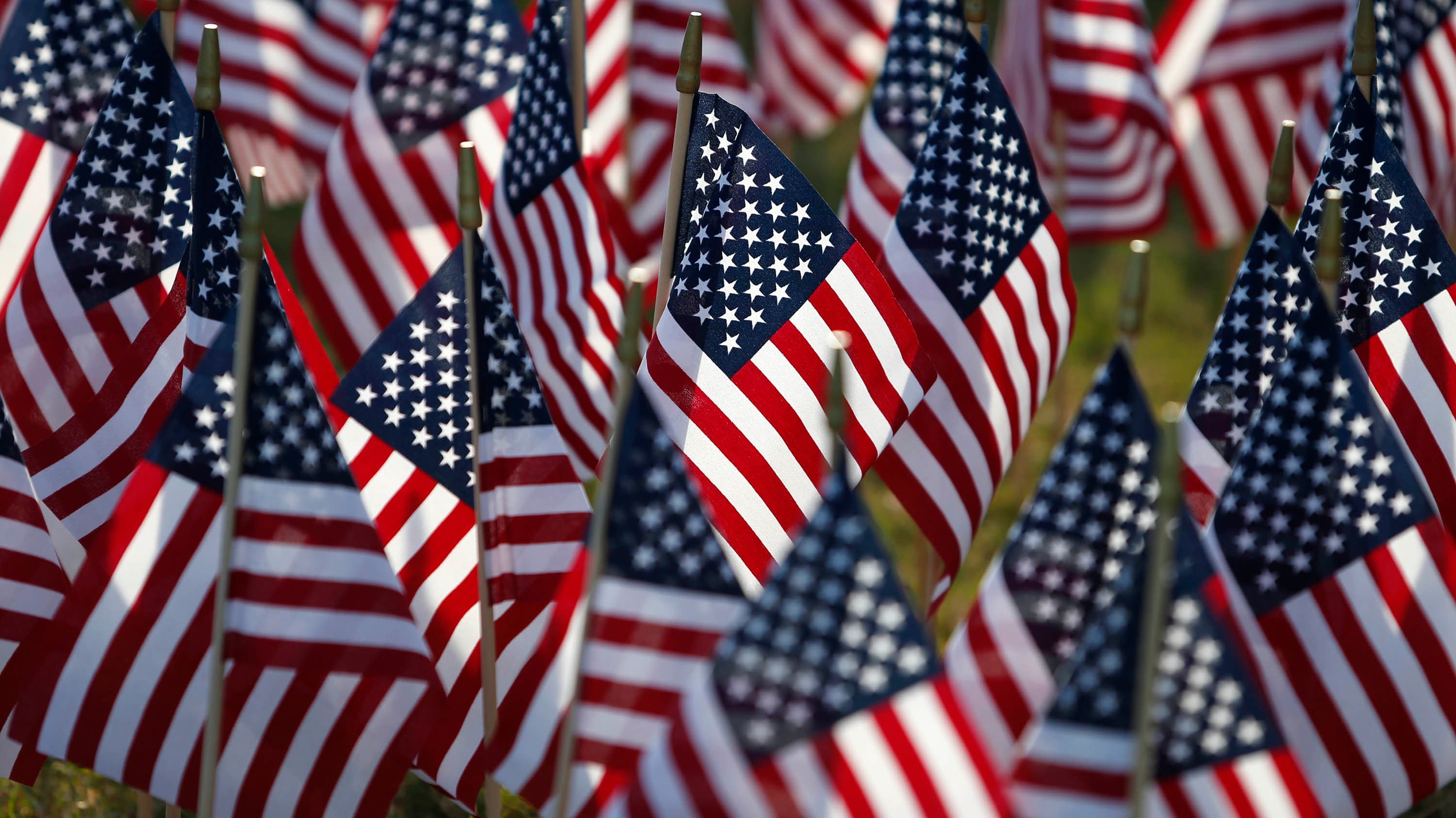 Small USA flags representing veterans