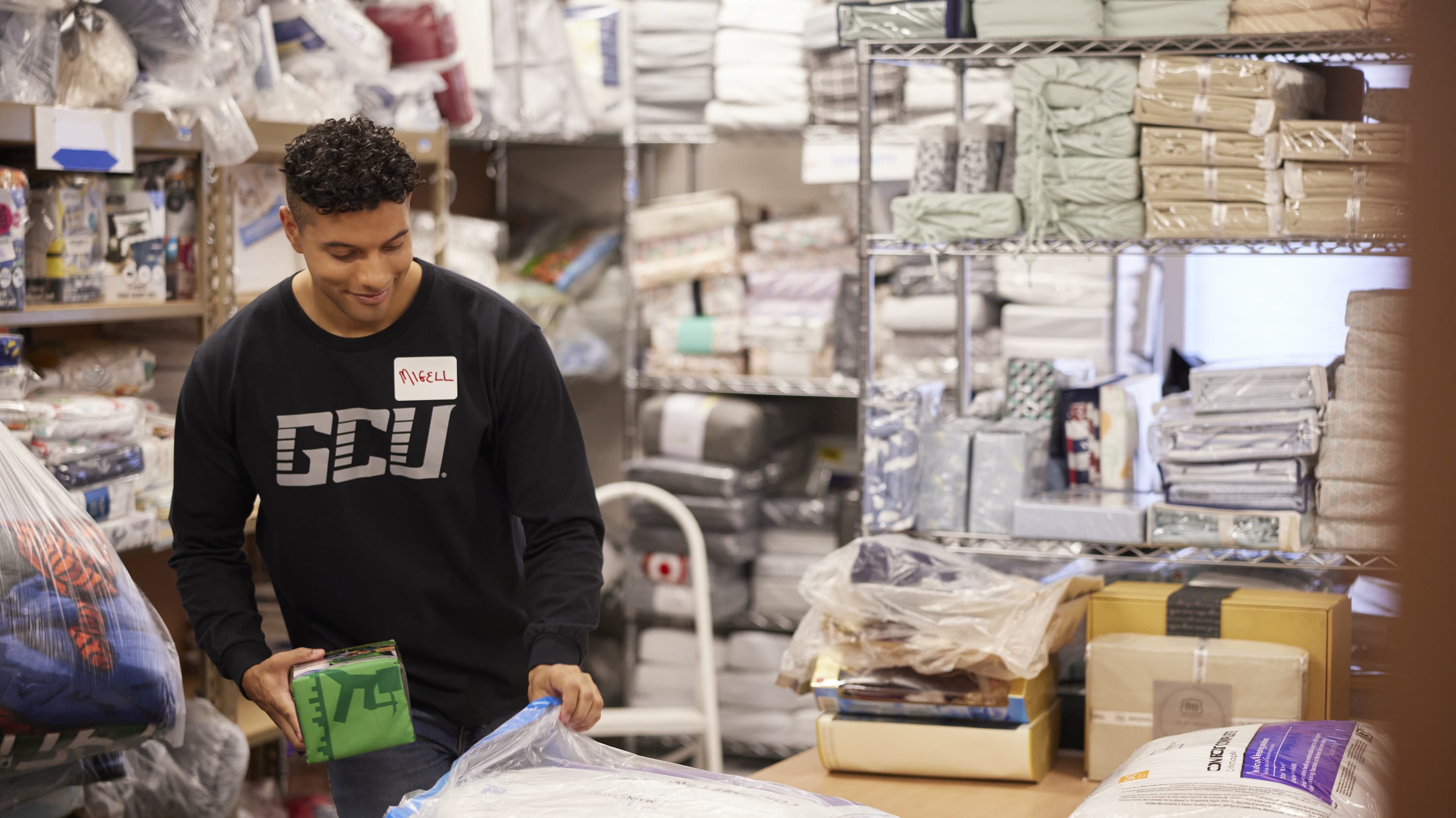 Student packing product inventory in a warehouse setting