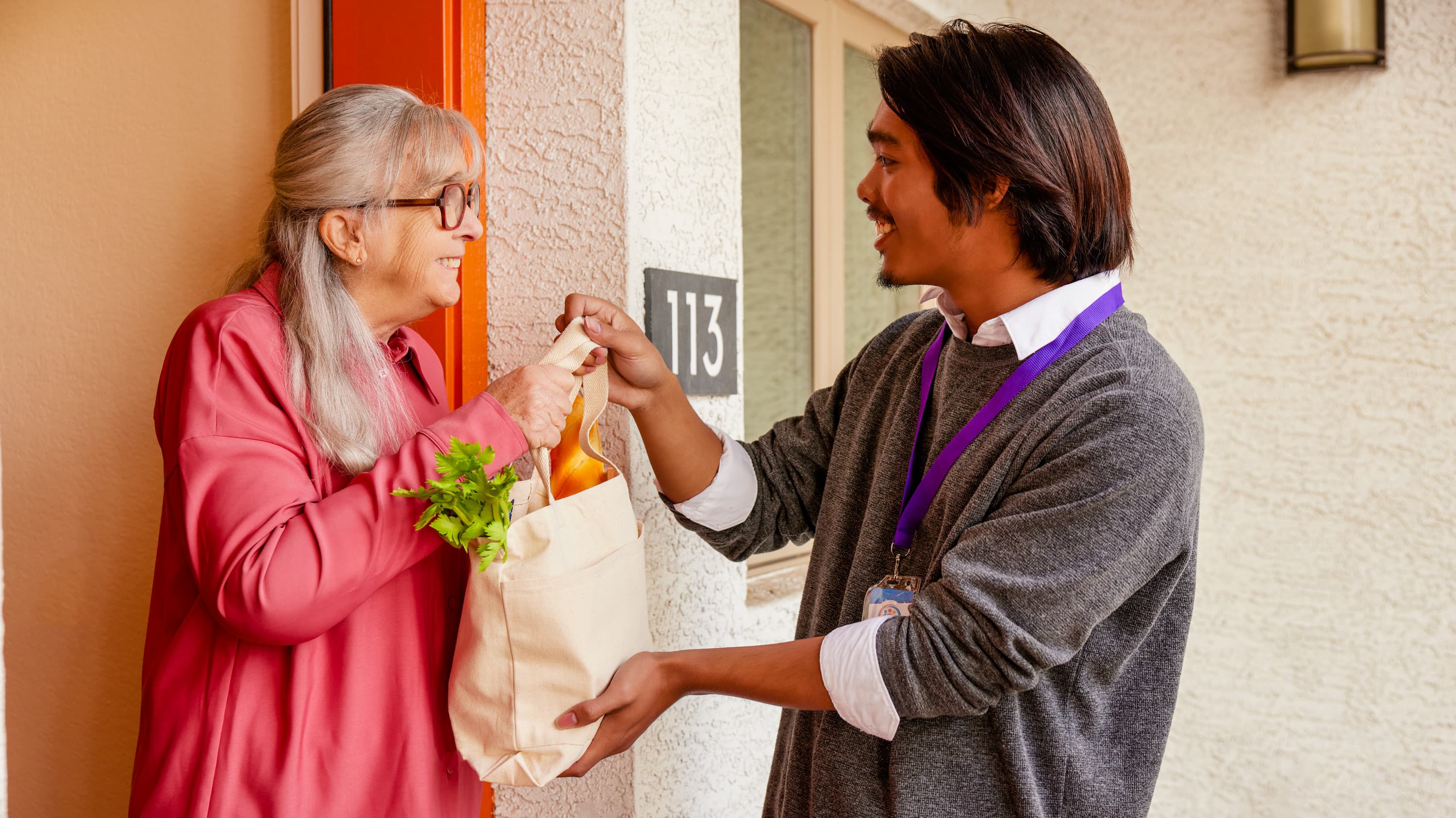 Geropsychology master's degree student delivering groceries to client