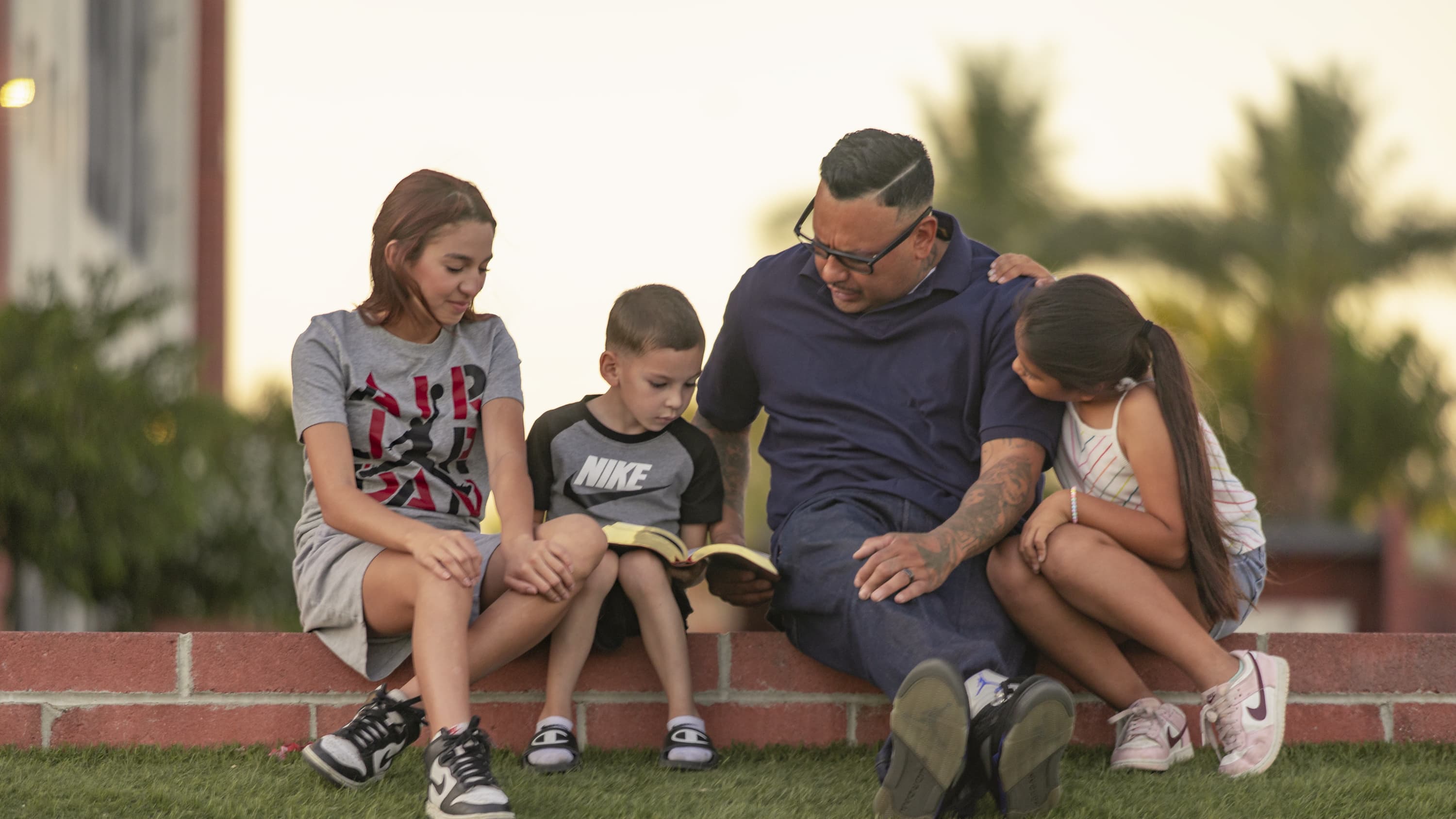 Family sitting together at Grove Lawn