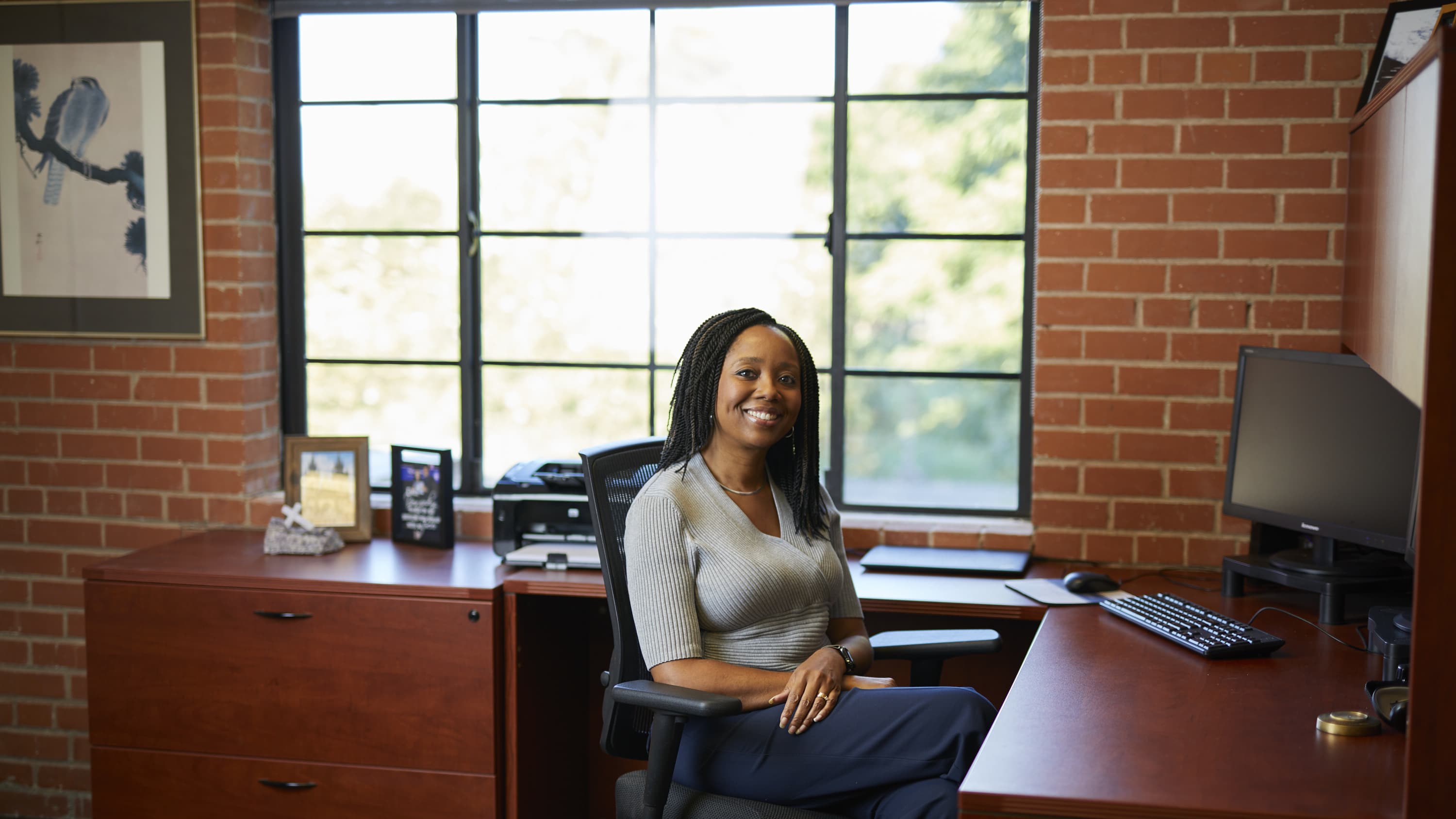 Woman in business sitting down in desk