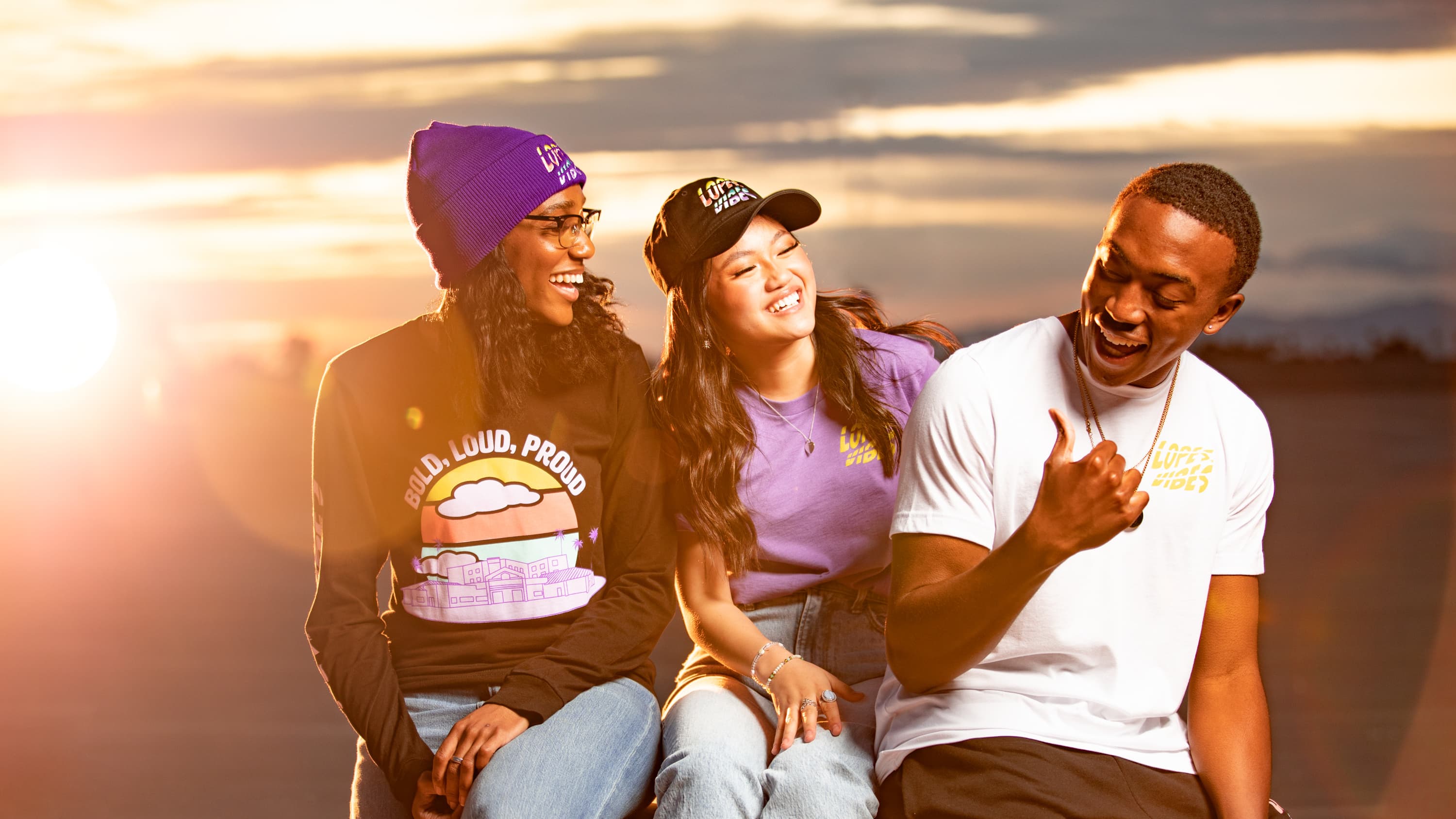 Students wearing GCU swag laughing together