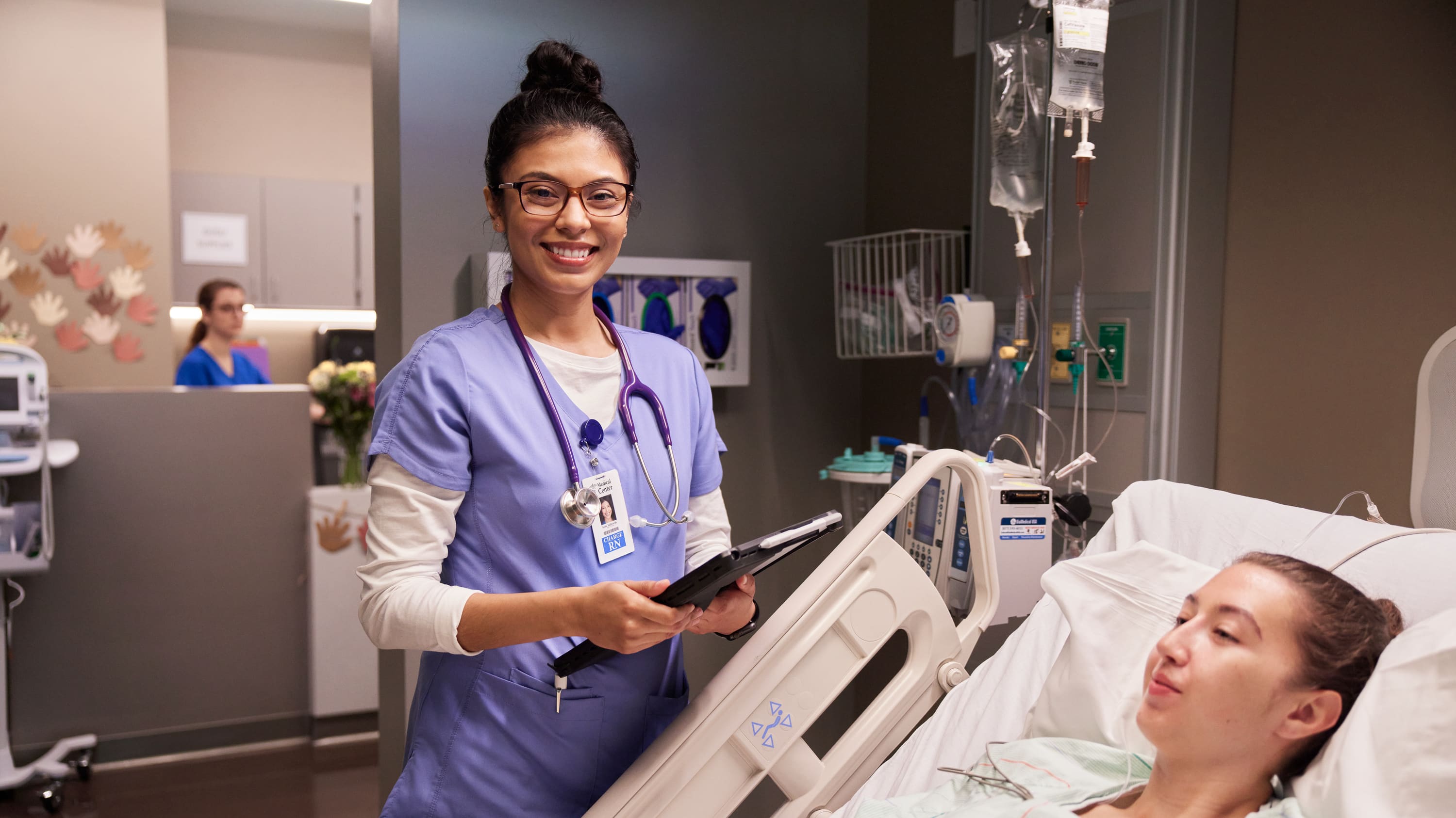 Nurse practitioner with patient