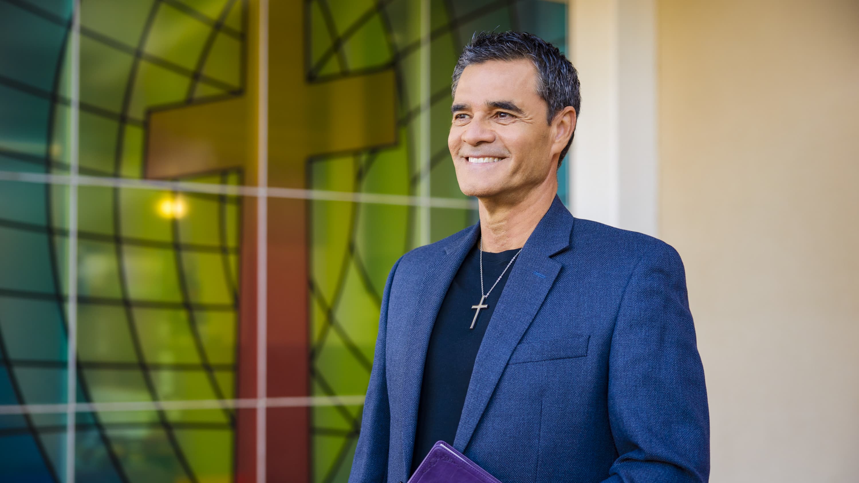 Master's professor smiling