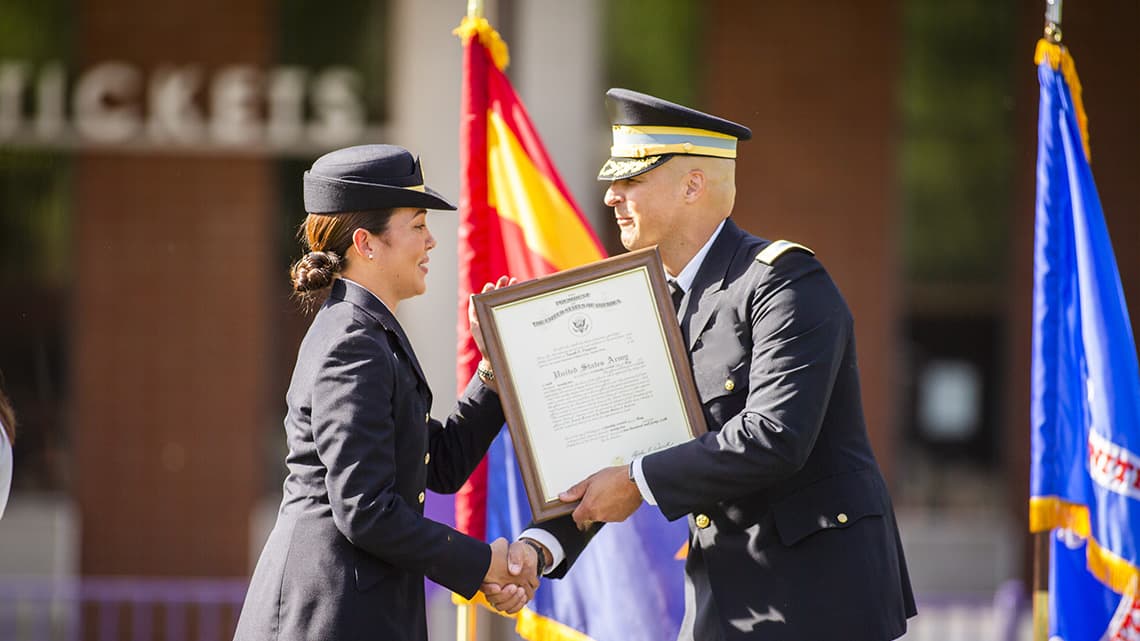 ROTC recruit receiving an award