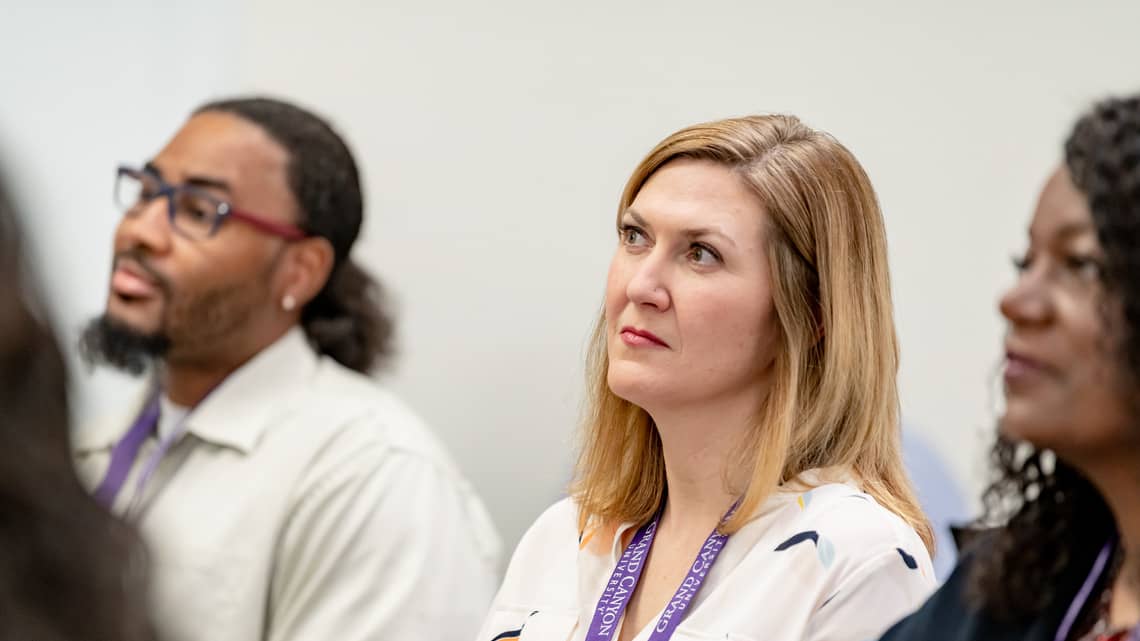 Doctoral residency students giving attention to the speaker