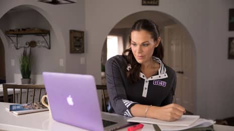 Education doctoral student does coursework online at home