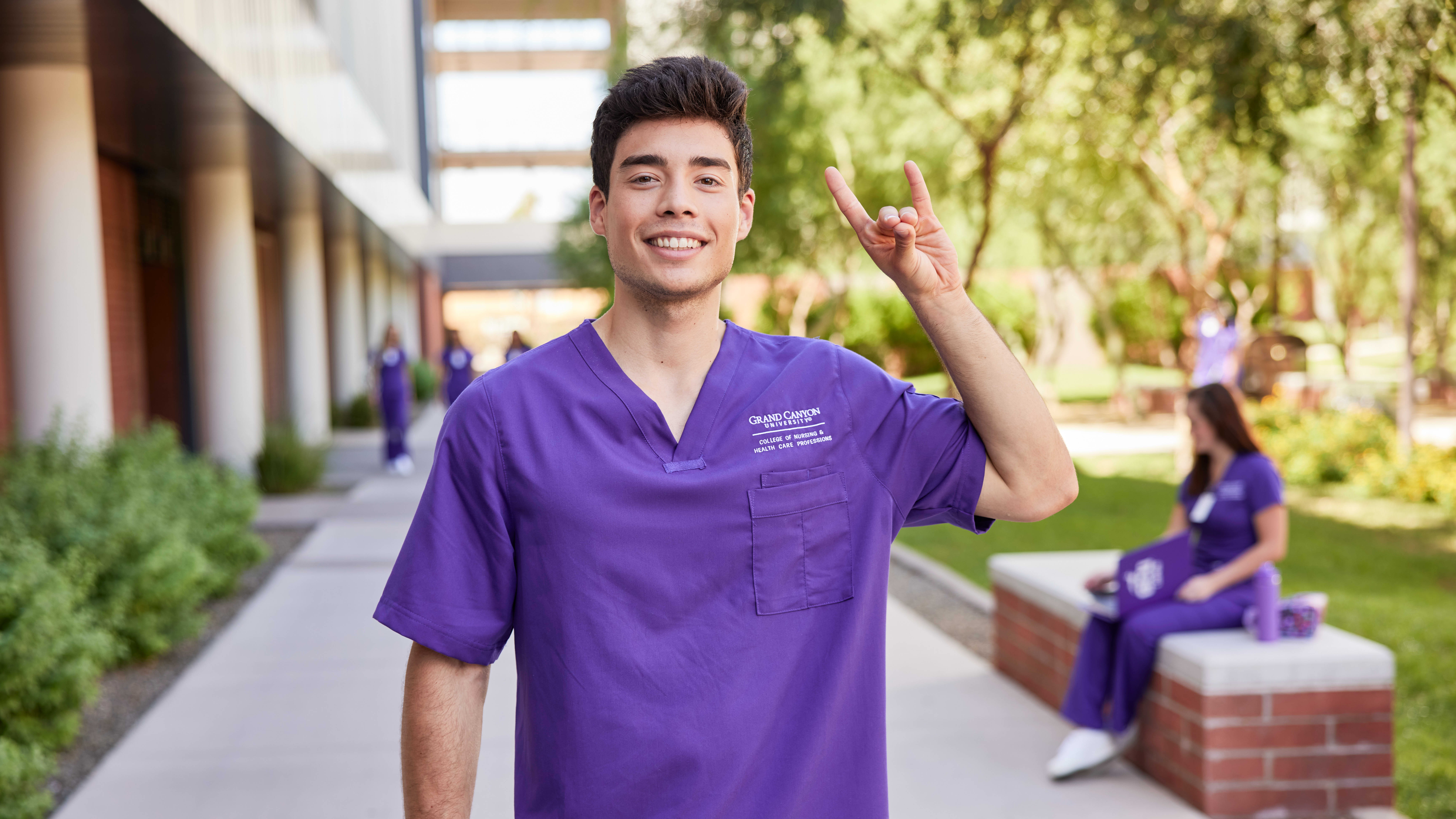 Nursing student holding up Lopes