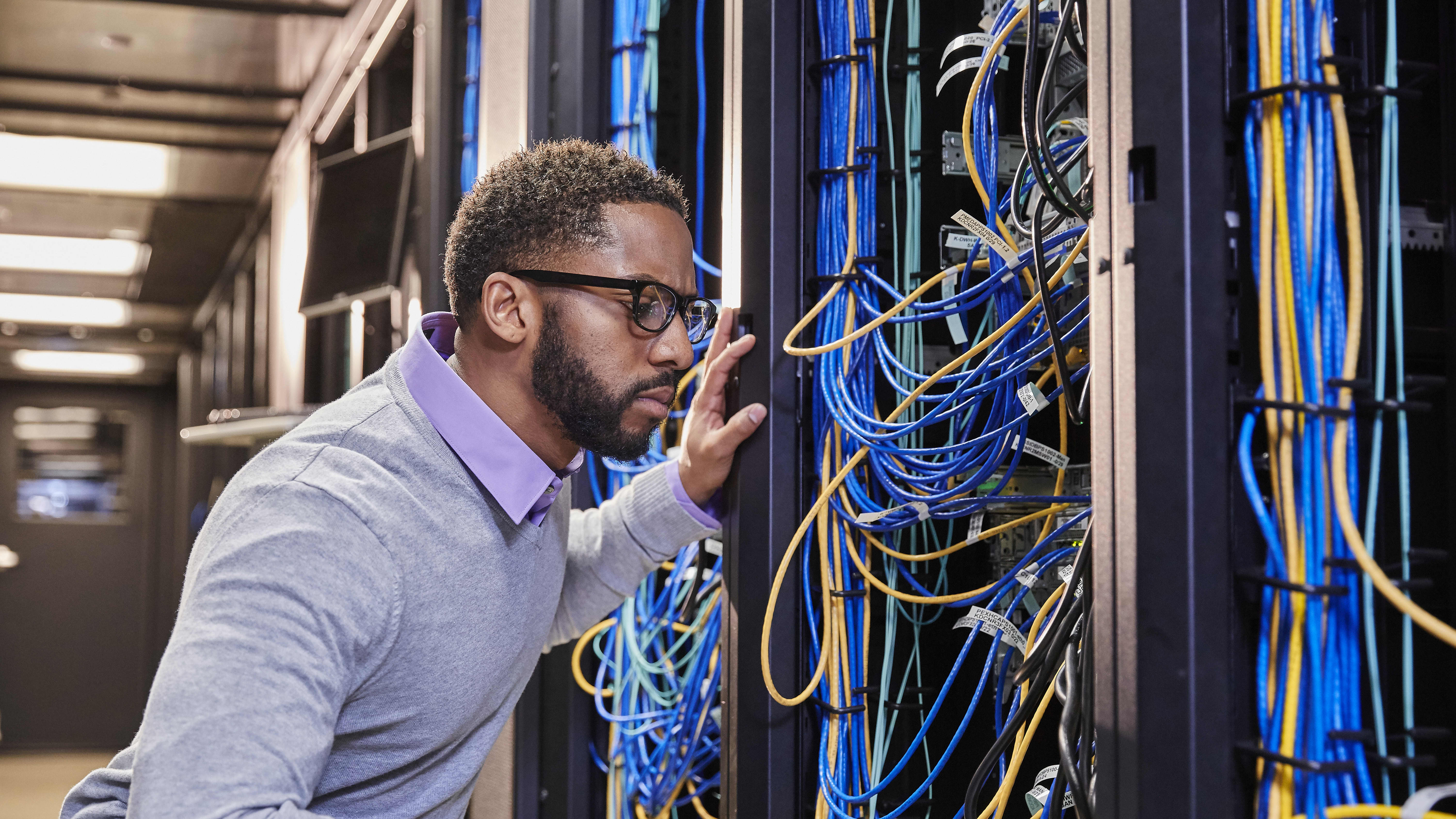 Technology Student Works in Wire Room for computer development 