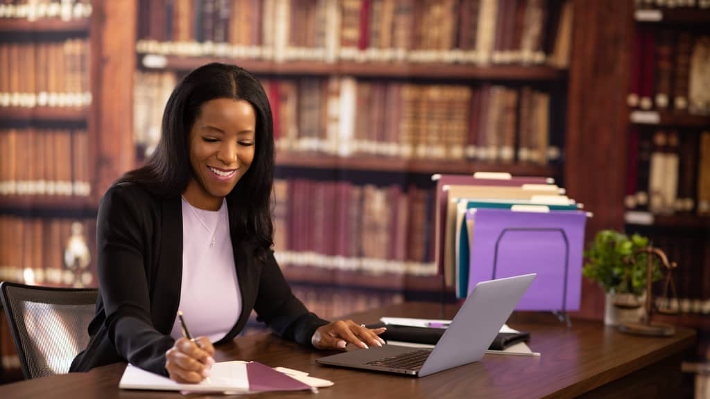 healthcare manager at her desk working