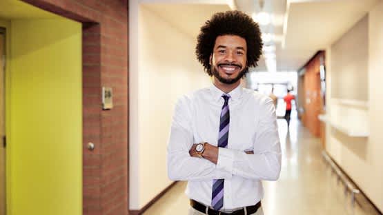 Male Teaching Degree Student Smiling On Campus