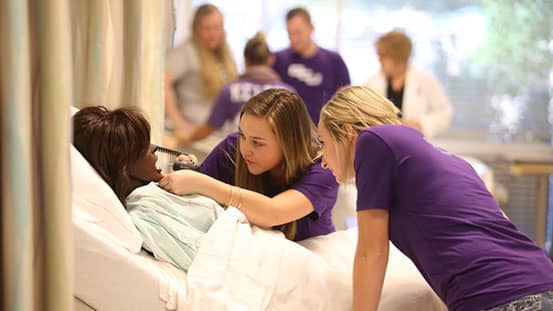 GCU nursing students working in simulation lab