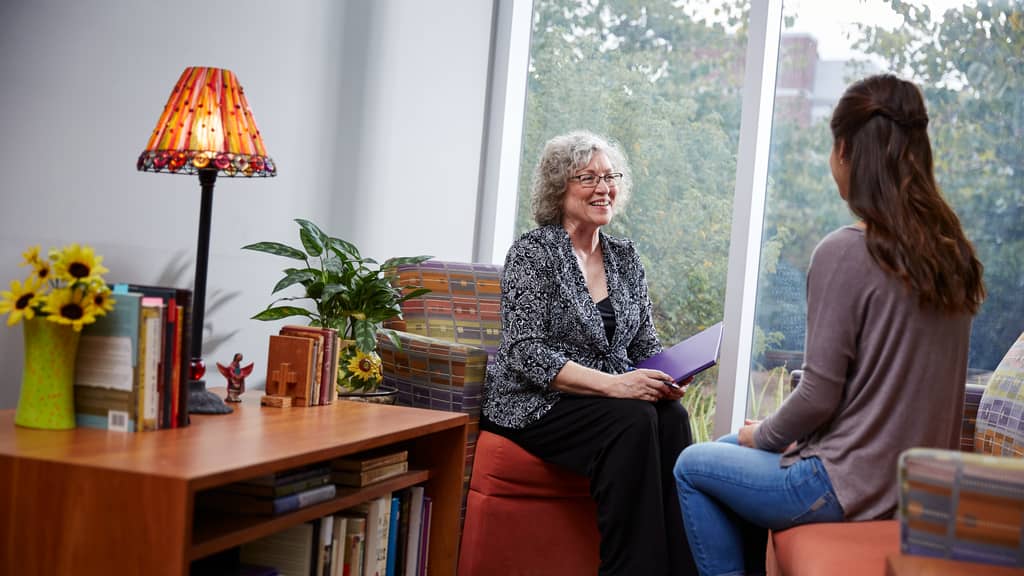 Counselor Meets With High School Student in Office