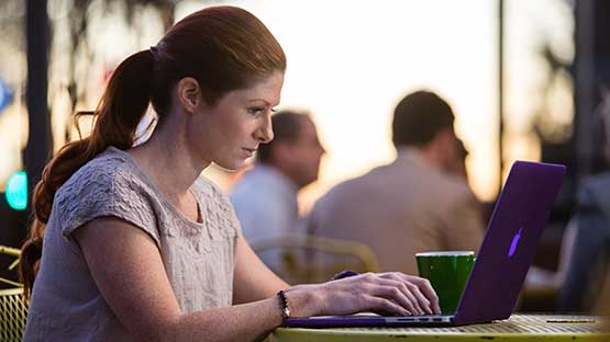 Prospective airwoman student uses laptop