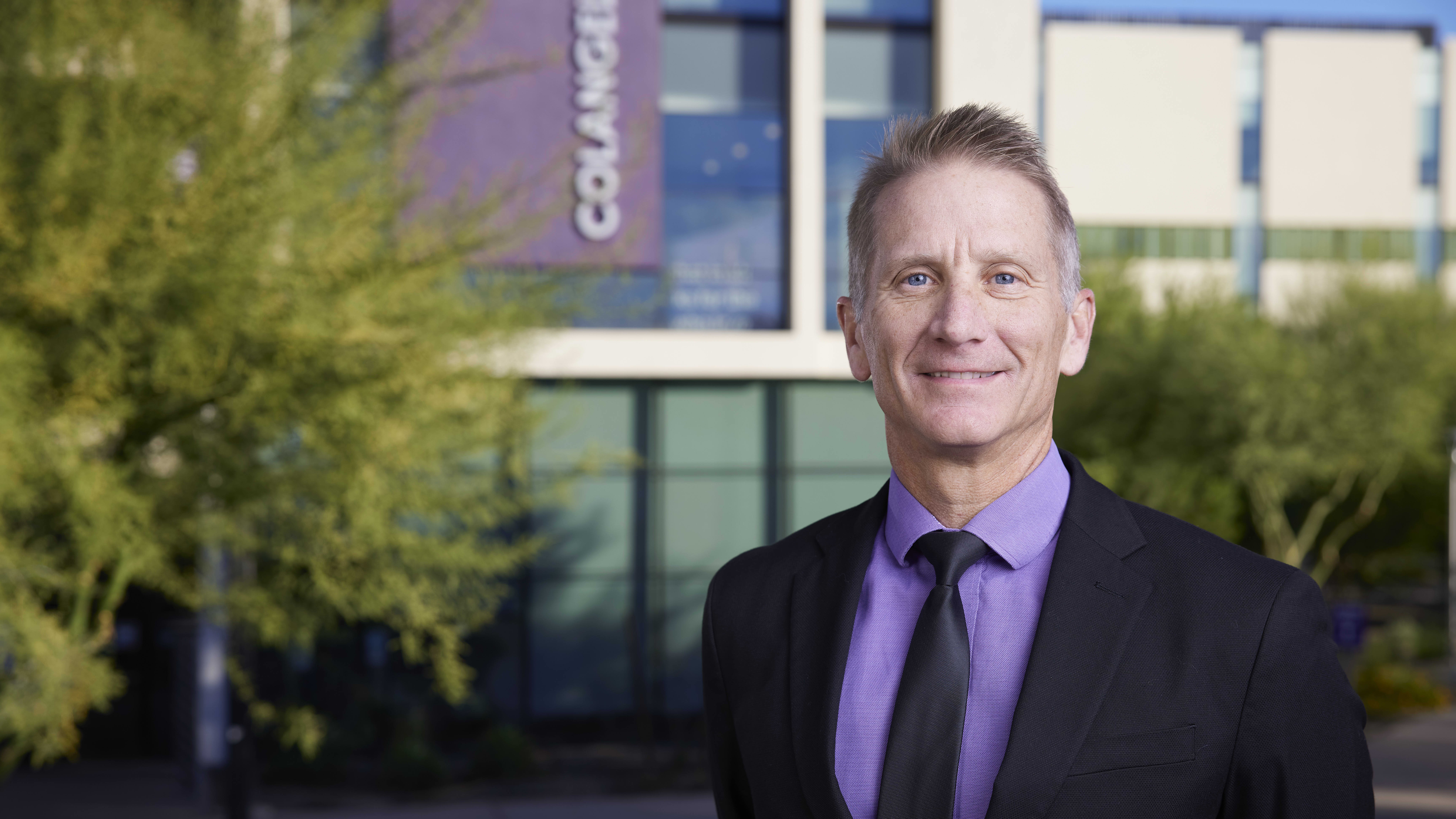 Dr. Gibb outside CCOB building