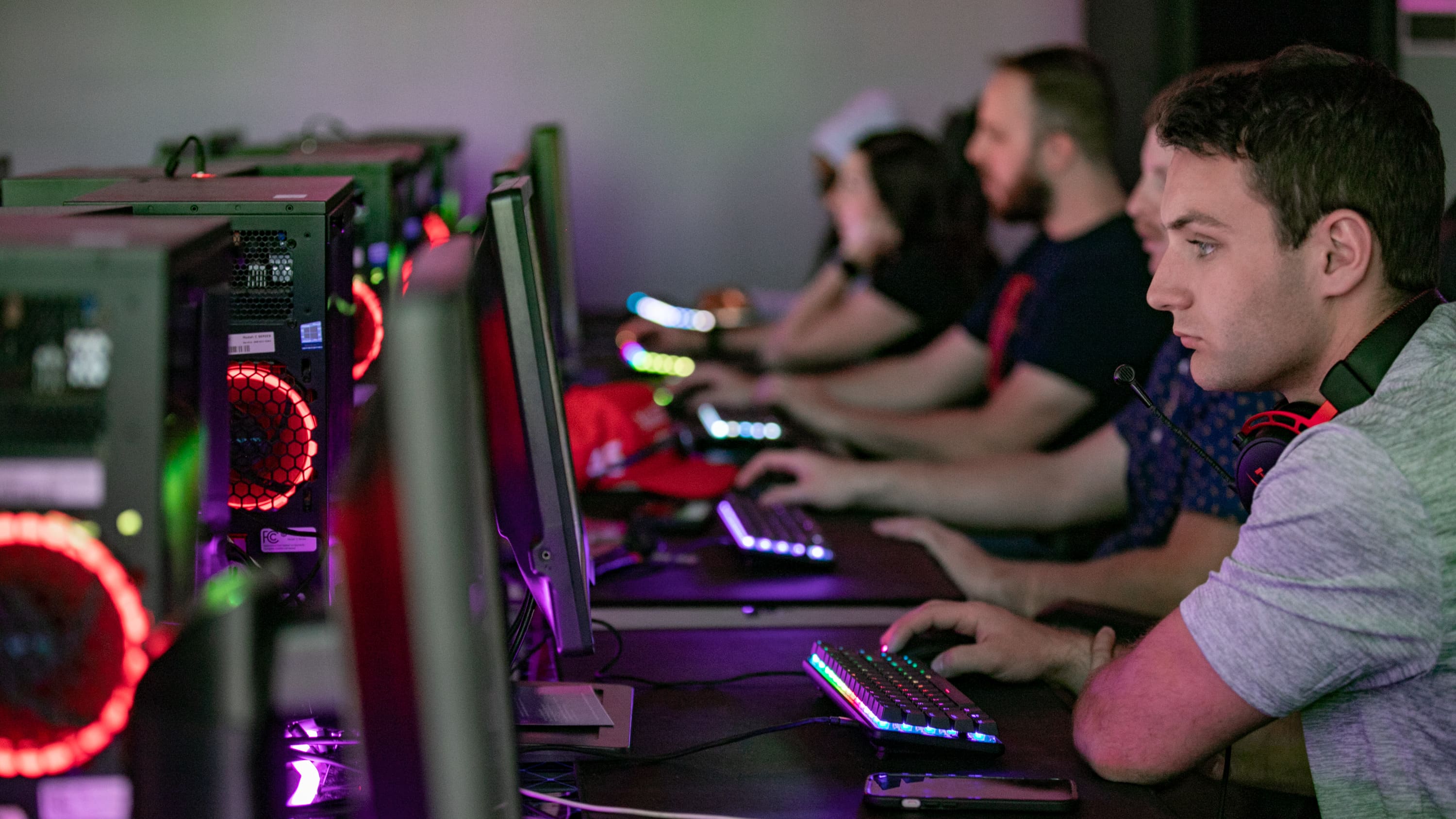 Students on their computers playing esports