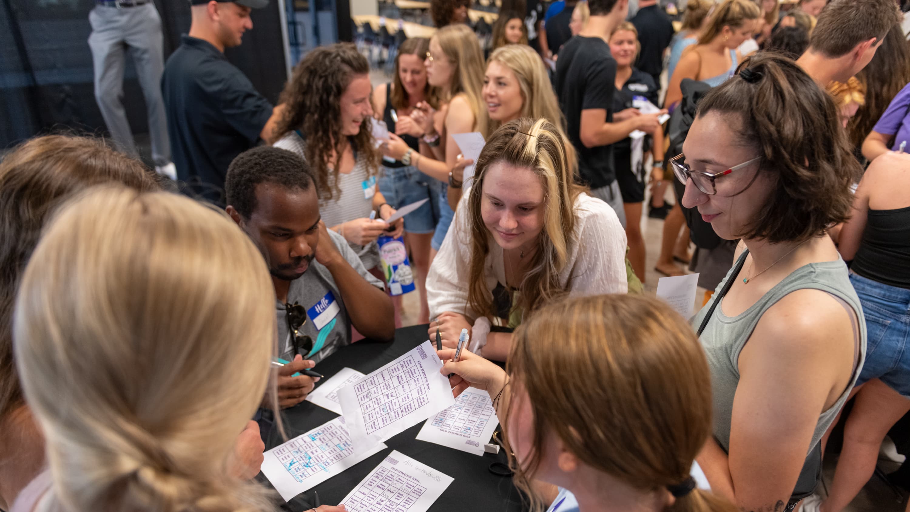 Students having conversations at table