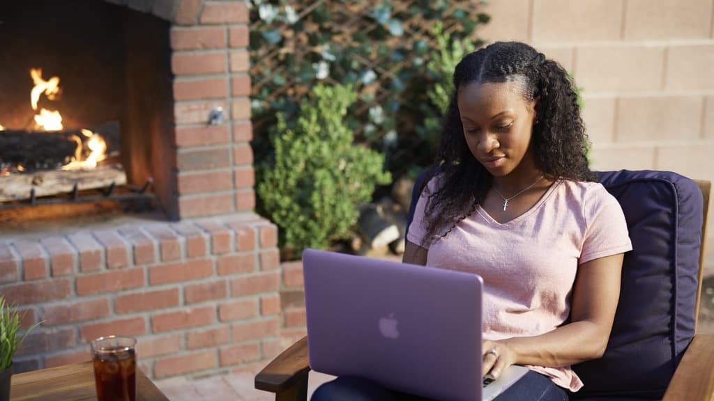 woman using laptop for class