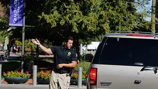 security guard directing visitor