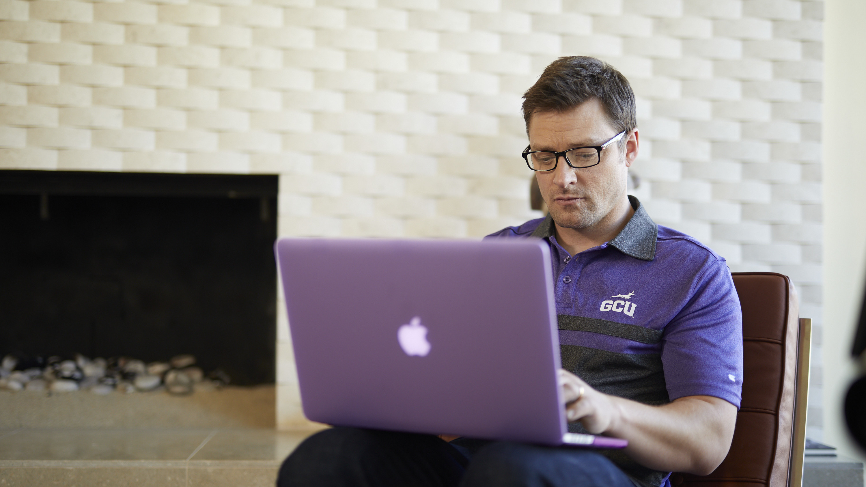 a man takes a test at home on his laptop