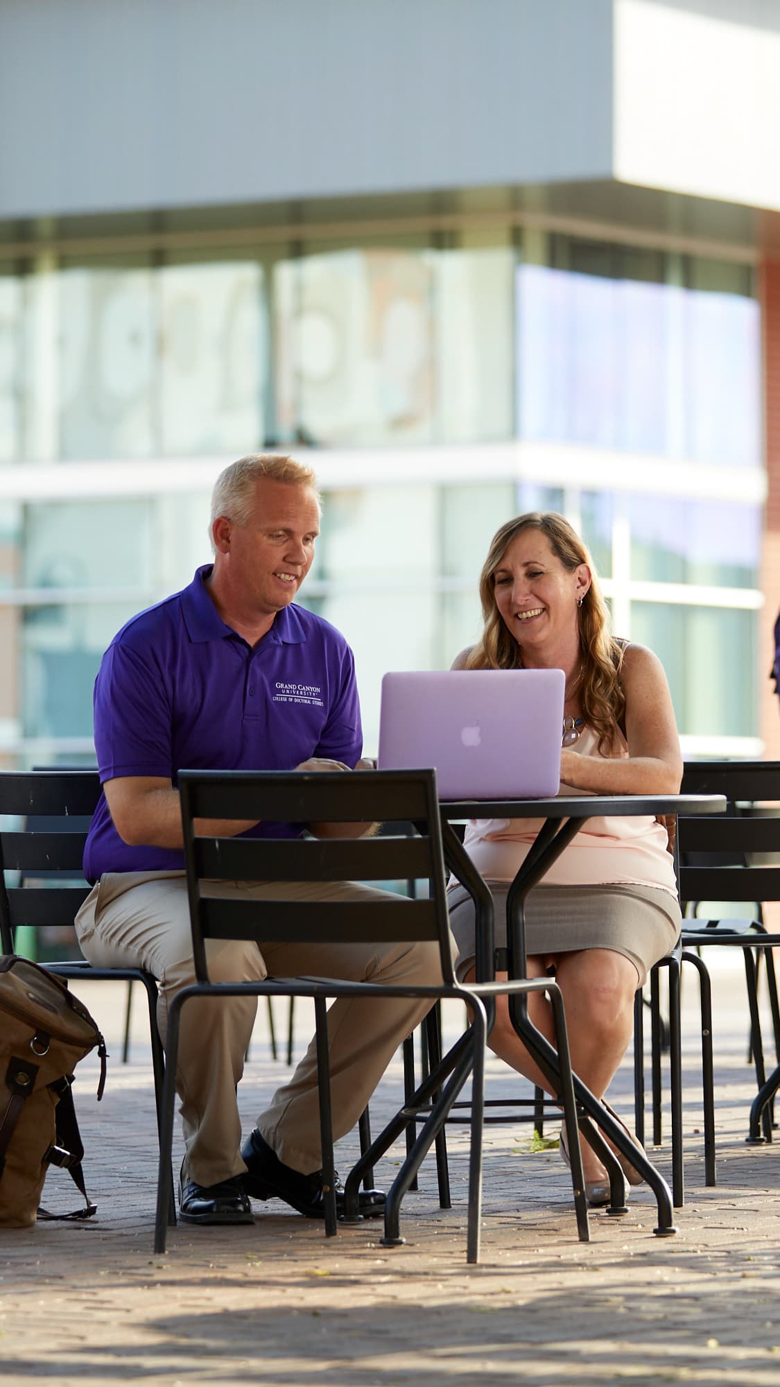 Teacher working with student