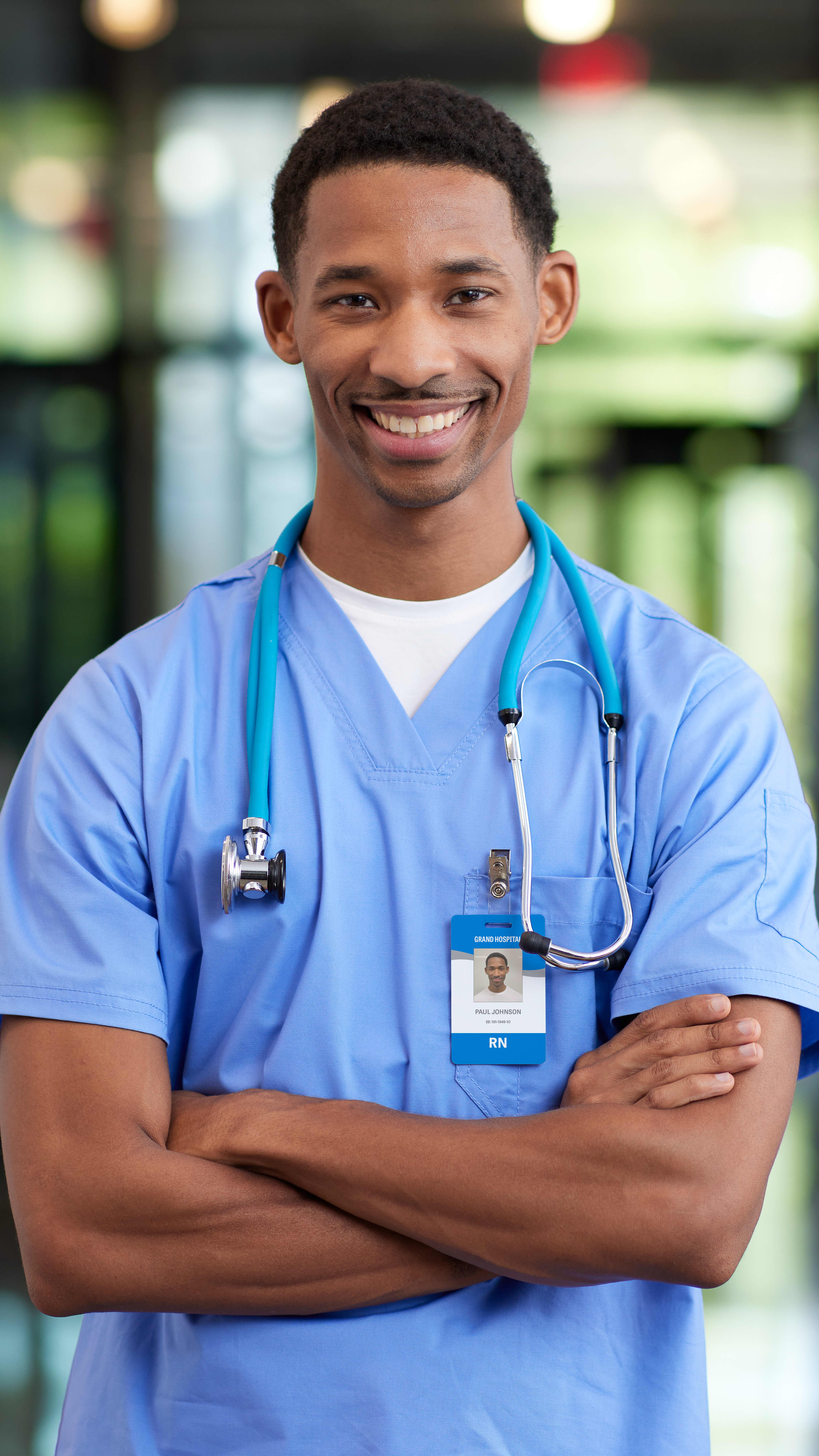 Male RN to BSN degree student smiling in hospital