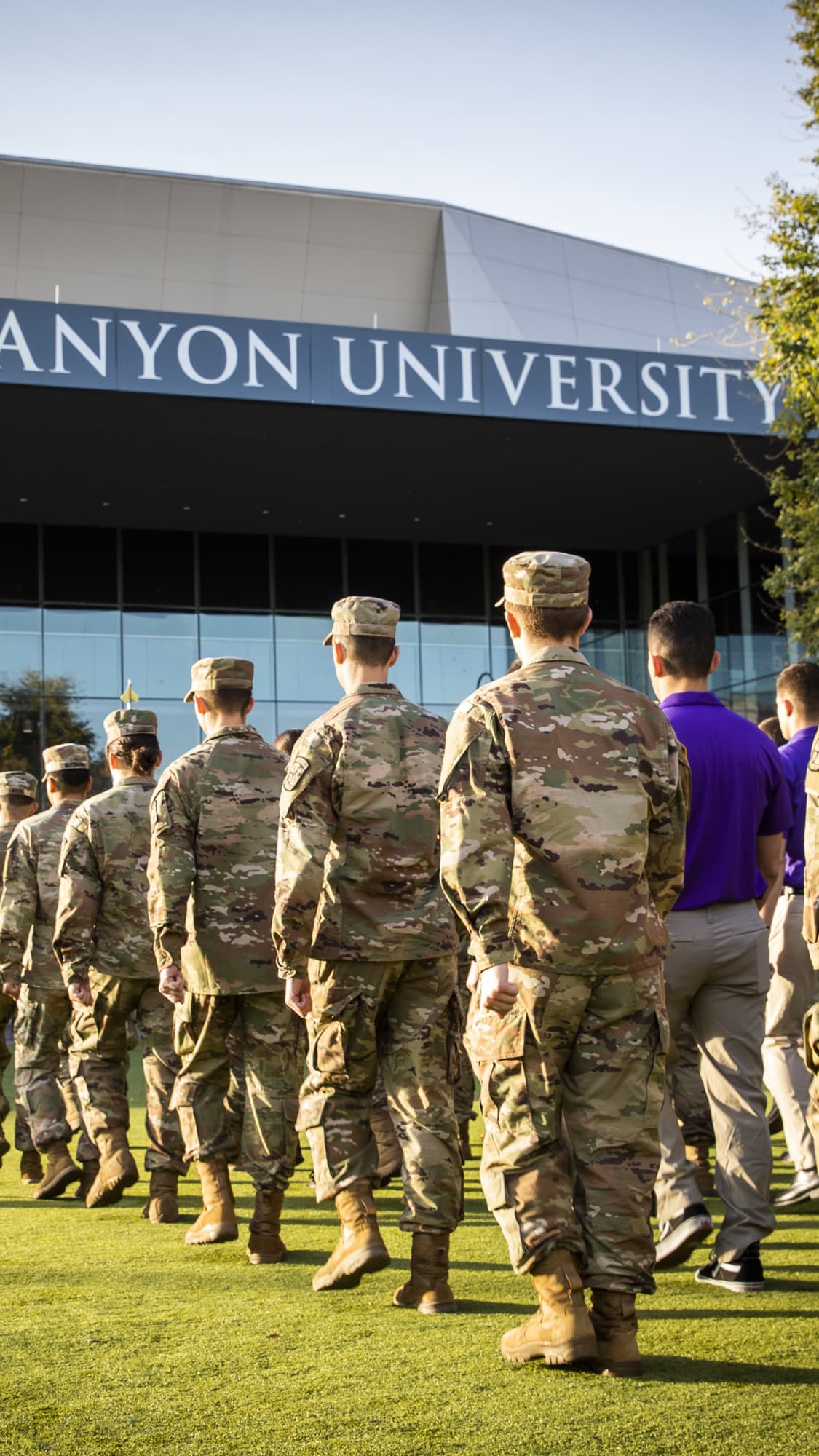 ROTC members marching into arena