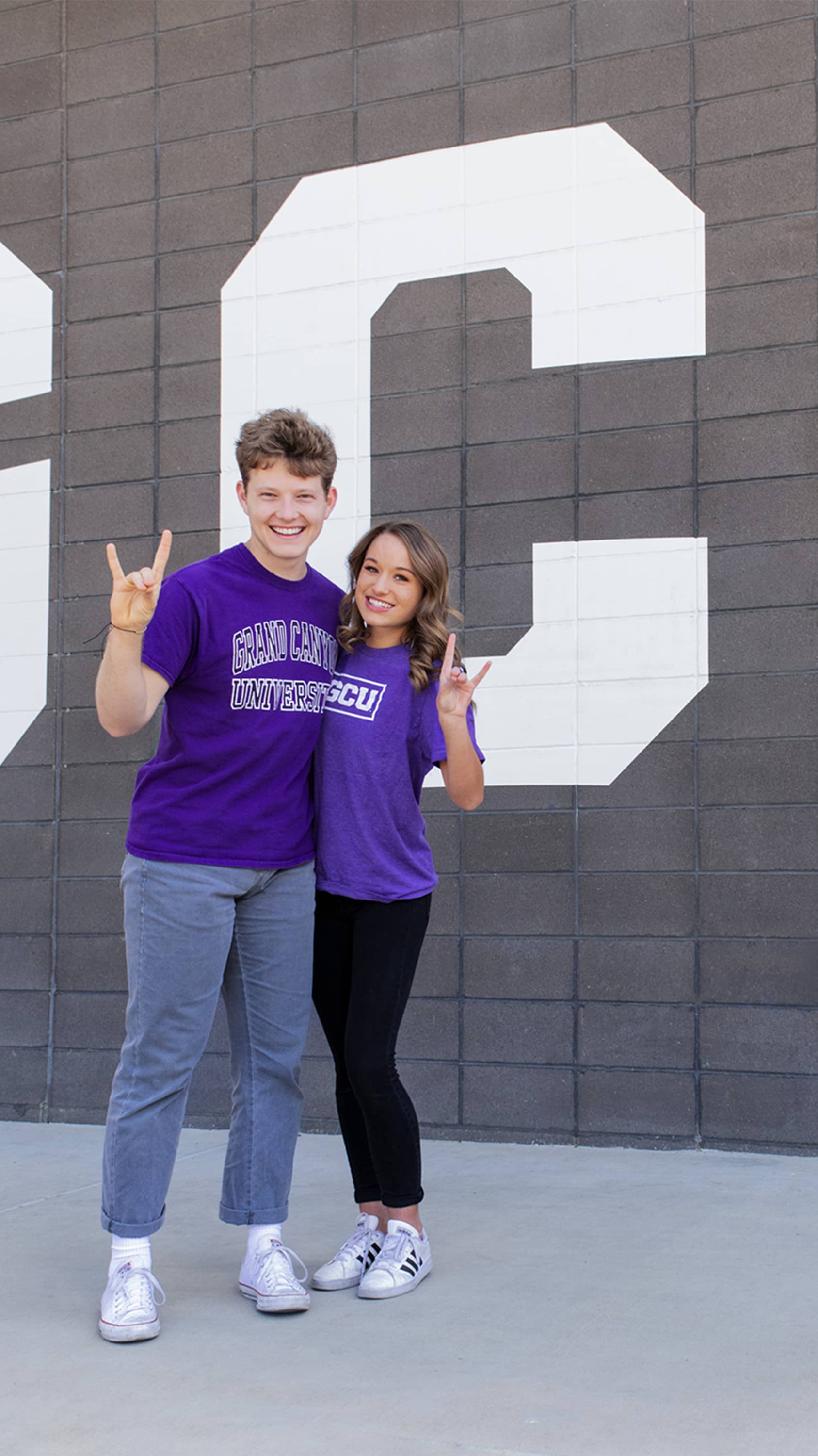 Honors College students holding Lopes Up