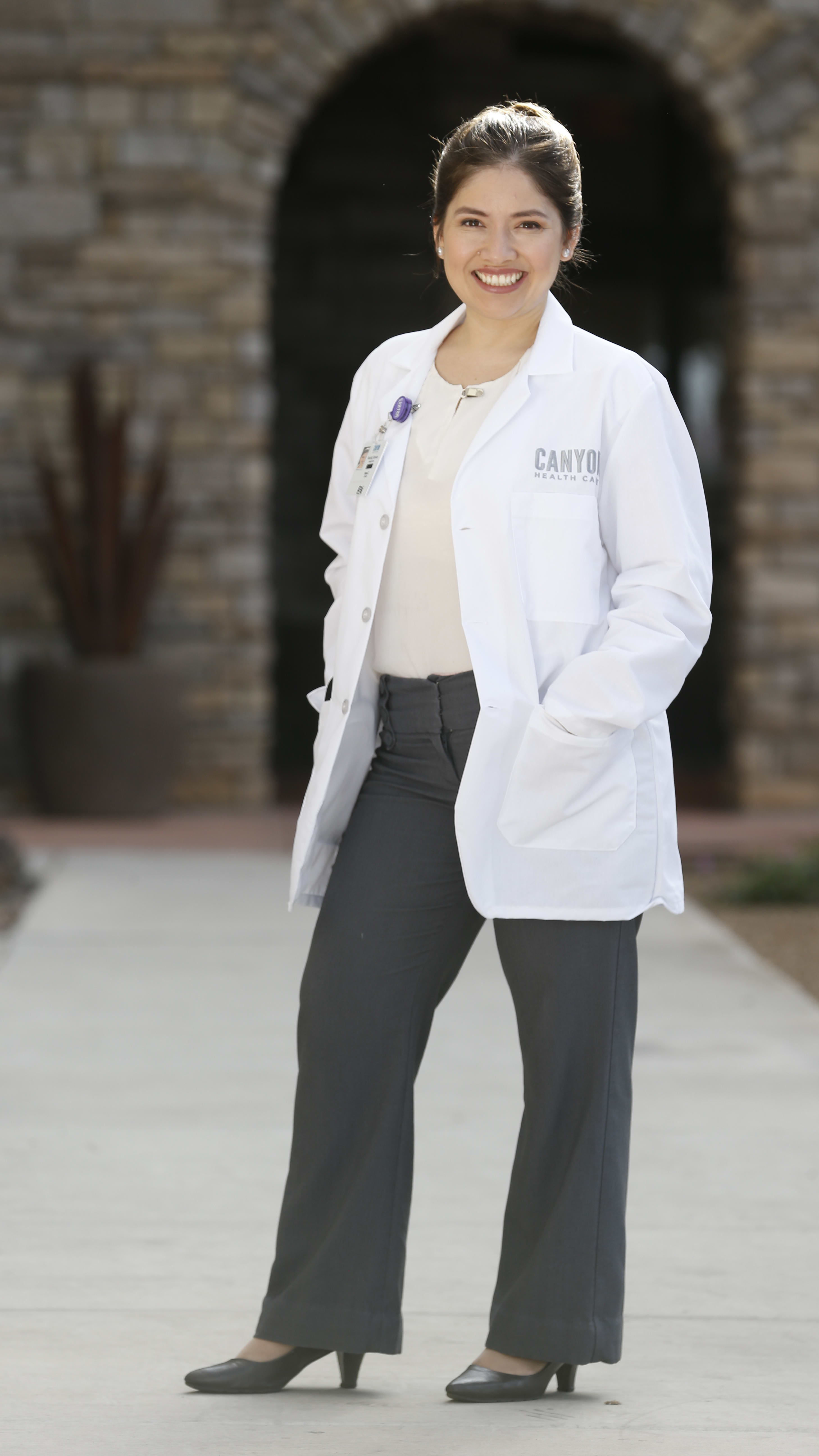 female nurse portrait in white coat