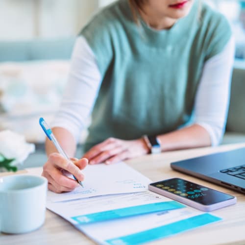 Young female managing expenses 