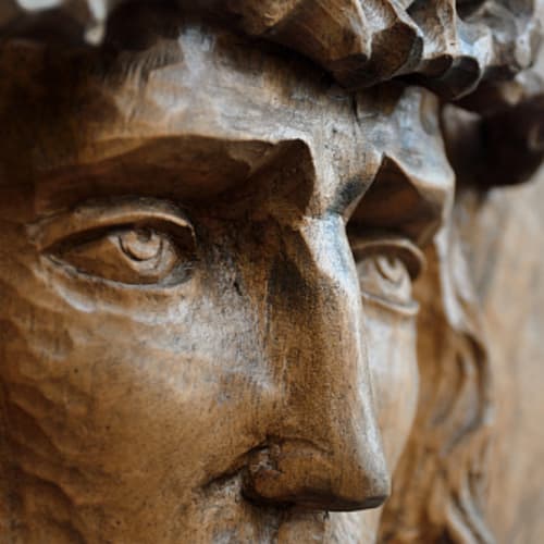 Closeup of a wooden Grecian or Roman statue