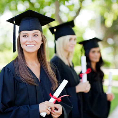 Girl holding her bachelor's degree in psychology