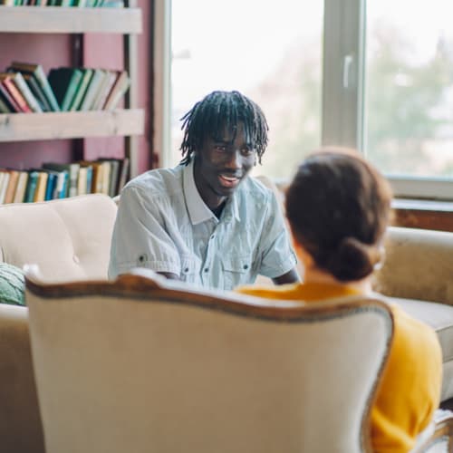 Coaching or therapy session with a young man