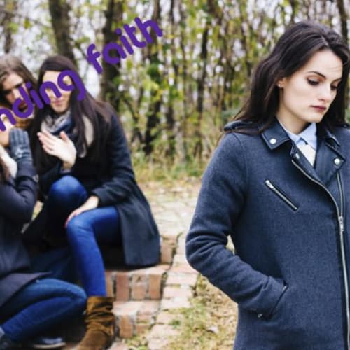 A student being bullied by a group of peers