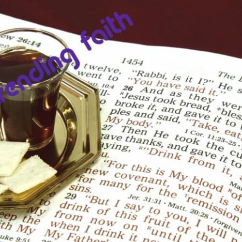 Communion wafers and wine sitting on the Bible with the Trending Faith logo